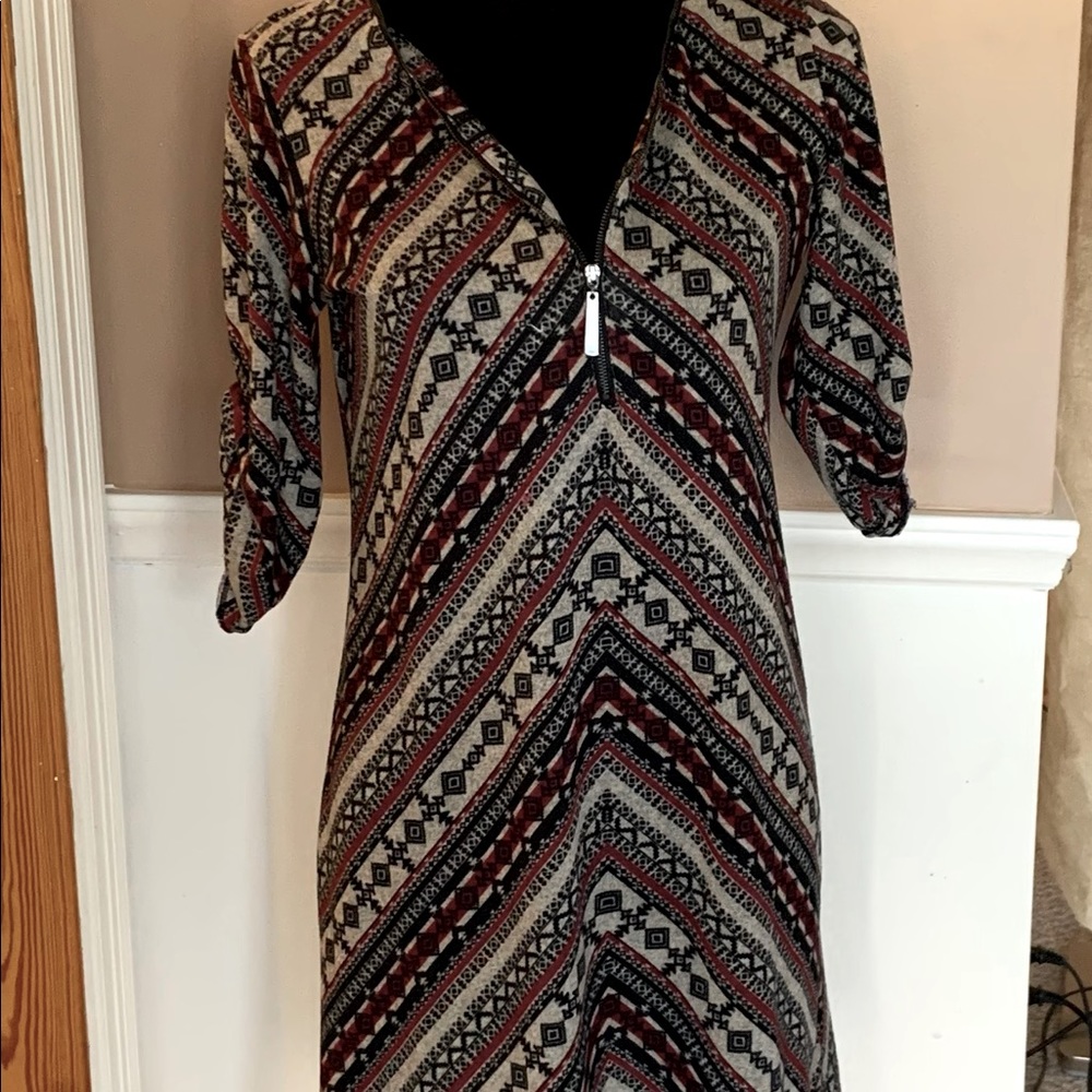Tacera size small zip dress. Great condition. Brown, tan and red. Lands mid calf